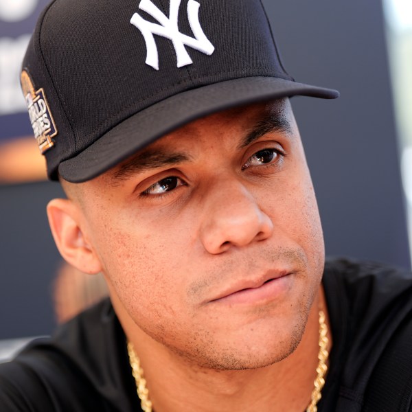 New York Yankees' Juan Soto speaks during media day for the baseball World Series against the Los Angeles Dodgers, Thursday, Oct. 24, 2024, in Los Angeles. (AP Photo/Julio Cortez)