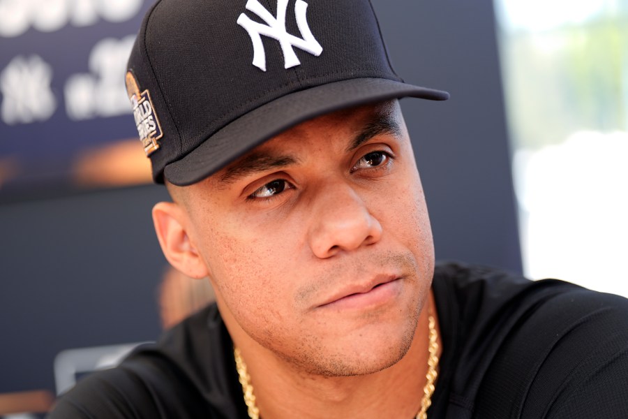 New York Yankees' Juan Soto speaks during media day for the baseball World Series against the Los Angeles Dodgers, Thursday, Oct. 24, 2024, in Los Angeles. (AP Photo/Julio Cortez)