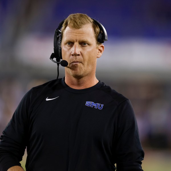 SMU head coach Rhett Lashlee walks the sideline during the first half of an NCAA college football game against Pittsburgh in Dallas, Saturday, Nov. 2, 2024. (AP Photo/Gareth Patterson)