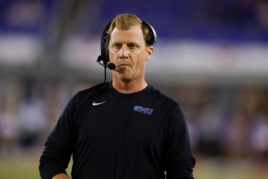 SMU head coach Rhett Lashlee walks the sideline during the first half of an NCAA college football game against Pittsburgh in Dallas, Saturday, Nov. 2, 2024. (AP Photo/Gareth Patterson)