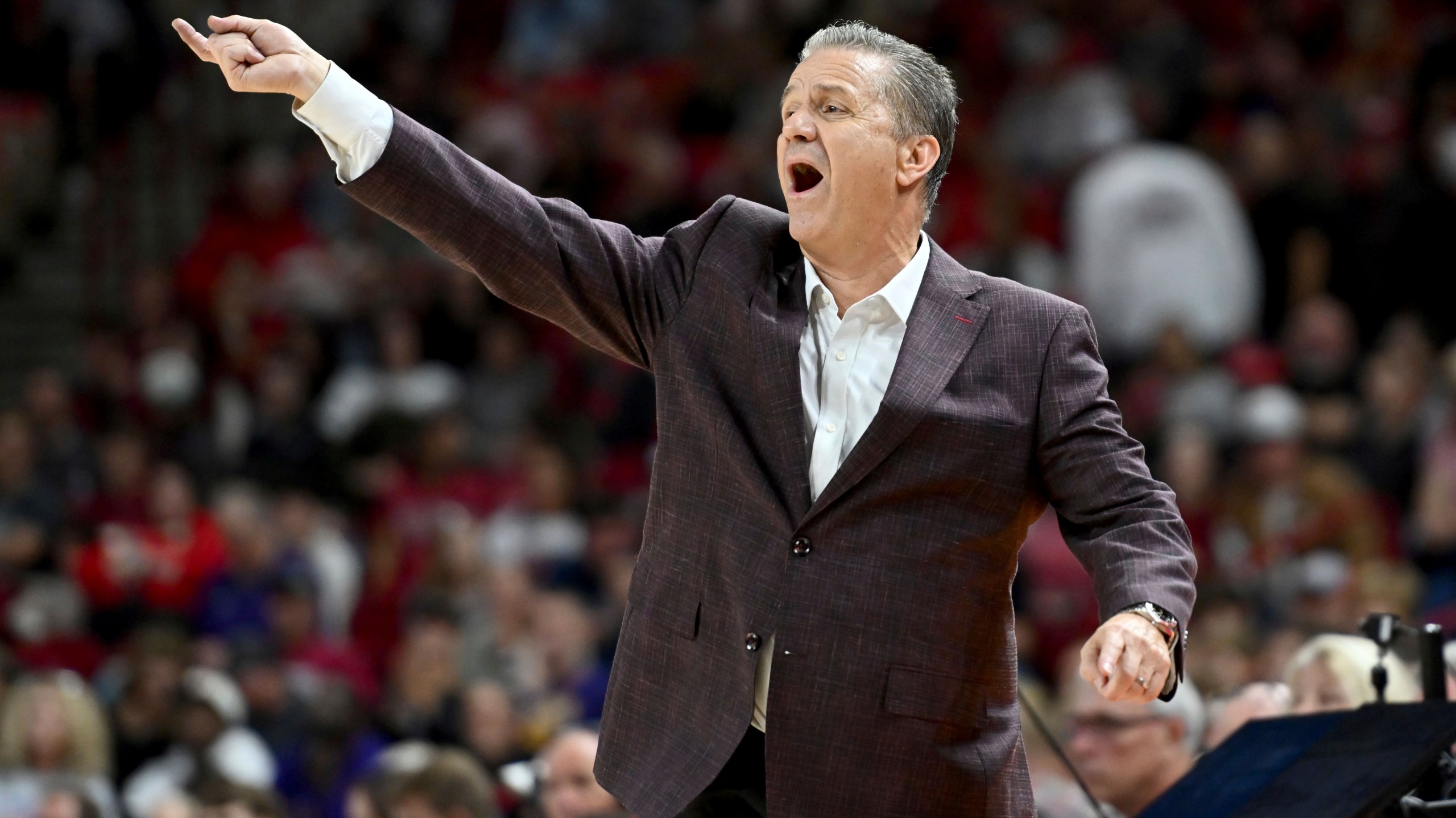 Arkansas coach John Calipari talks to his team from the sideline against Lipscomb during the second half of an NCAA college basketball game Wednesday, Nov. 6, 2024, in Fayetteville, Ark. (AP Photo/Michael Woods)