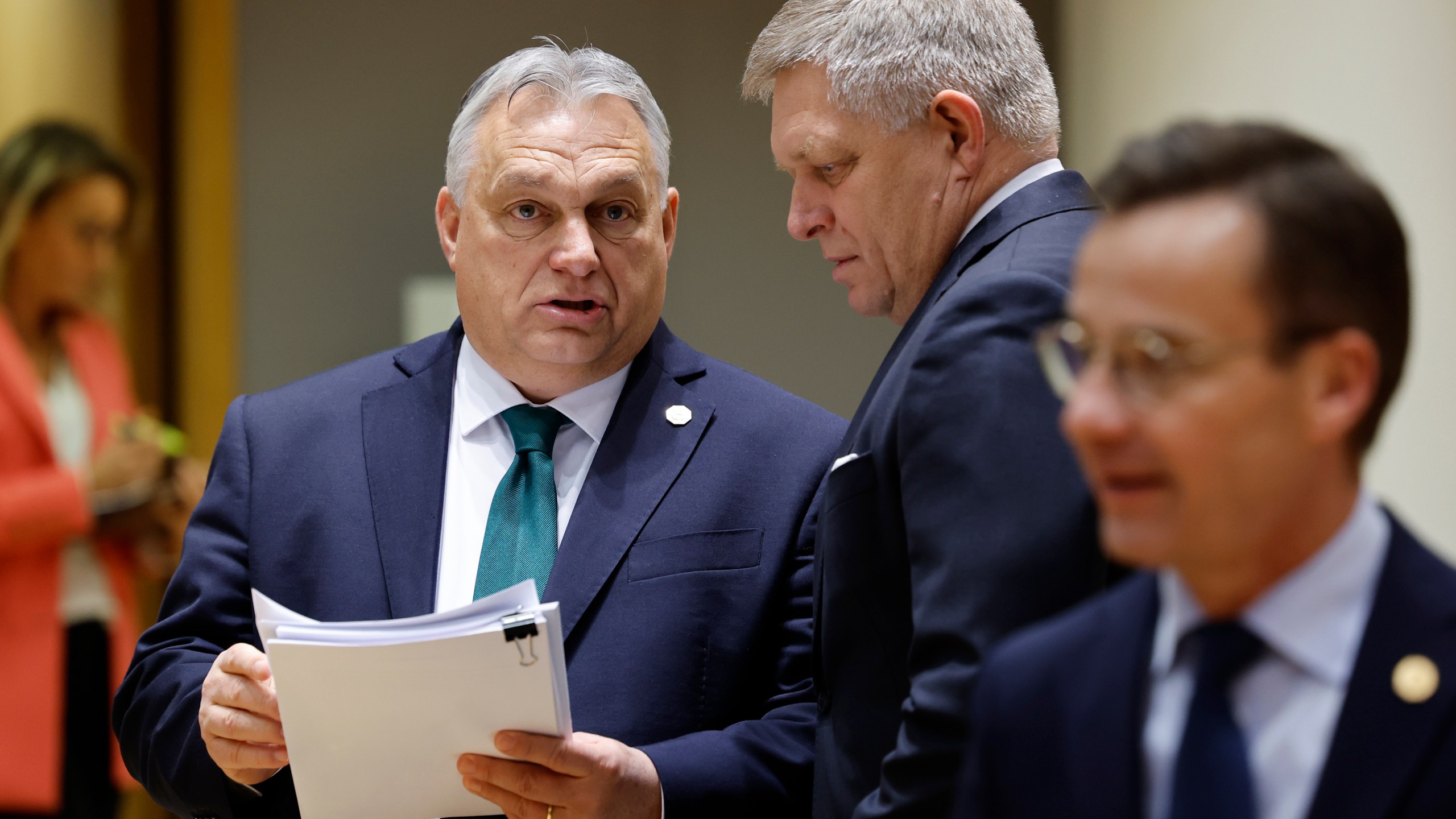 FILE - Slovakia's Prime Minister Robert Fico, right, talks to Hungary's Prime Minister Viktor Orban during a round table meeting at an EU summit in Brussels, on Feb. 1, 2024. (AP Photo/Geert Vanden Wijngaert, File)