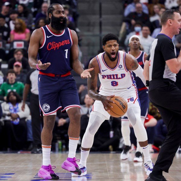 Philadelphia 76ers forward Paul George (8) and Los Angeles Clippers guard James Harden (1) react after a call during the first half of an NBA basketball game, Wednesday, Nov. 6, 2024, in Inglewood, Calif. (AP Photo/Ryan Sun)