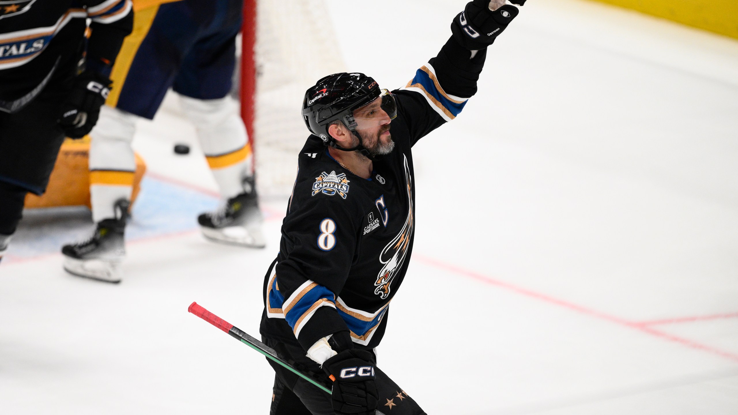 Washington Capitals left wing Alex Ovechkin (8) celebrates his goal during the third period of an NHL hockey game against the Nashville Predators, Wednesday, Nov. 6, 2024, in Washington. The Capitals won 3-2. (AP Photo/Nick Wass)