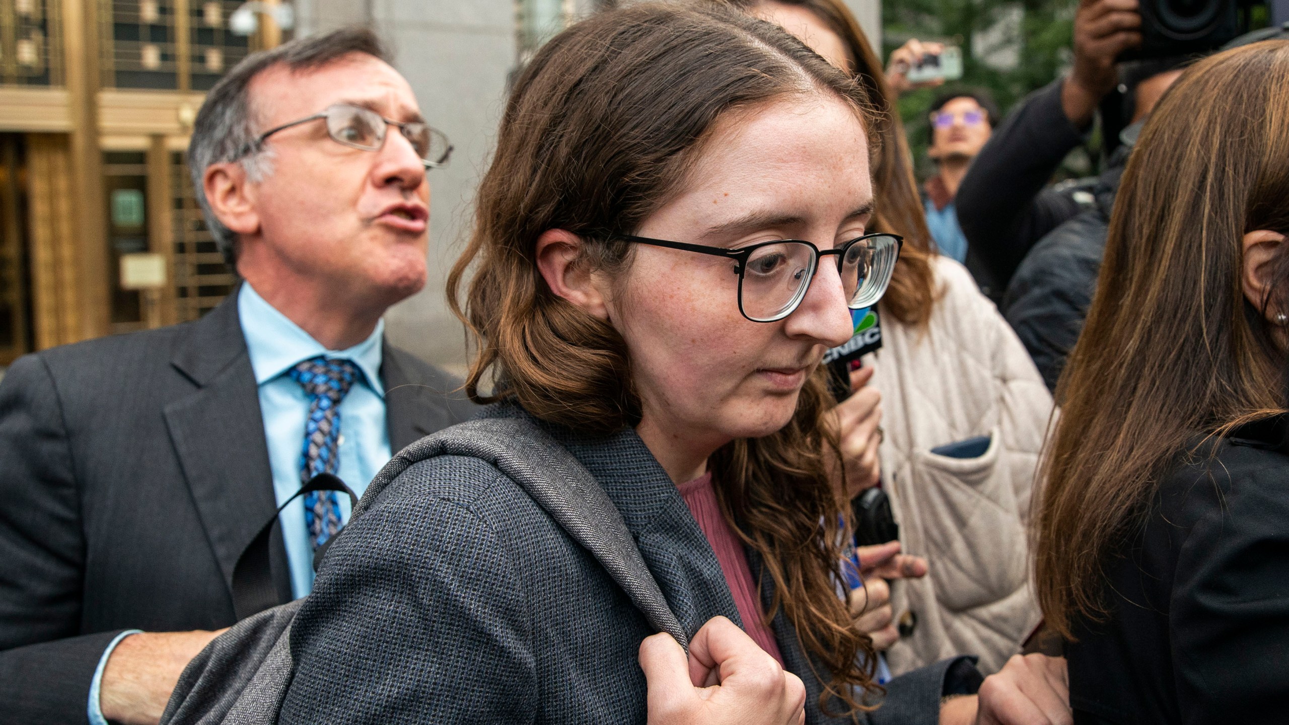 FILE - Caroline Ellison, former CEO of Alameda Research, founded by Sam Bankman-Fried, exits the Manhattan federal court after testifying, Oct. 10, 2023, in New York. (AP Photo/Eduardo Munoz Alvarez, File)