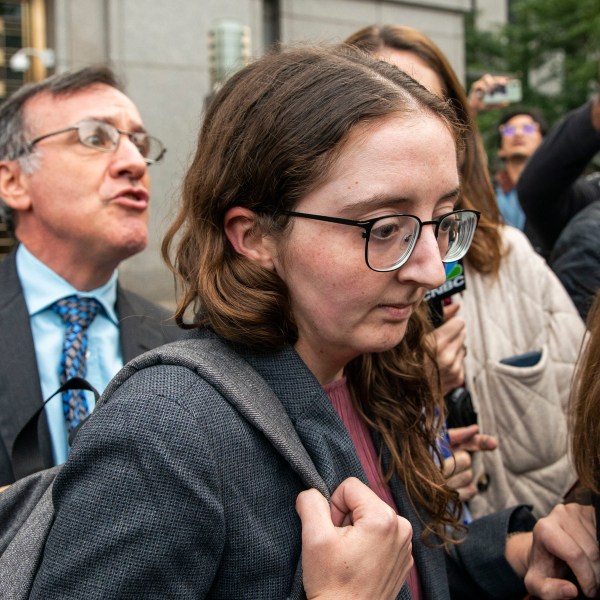 FILE - Caroline Ellison, former CEO of Alameda Research, founded by Sam Bankman-Fried, exits the Manhattan federal court after testifying, Oct. 10, 2023, in New York. (AP Photo/Eduardo Munoz Alvarez, File)