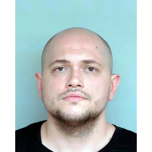 FILE - This undated booking photo provided by the Winona County, Minn., Detention Center shows Adam Fravel. (Winona County Detention Center via AP, File)