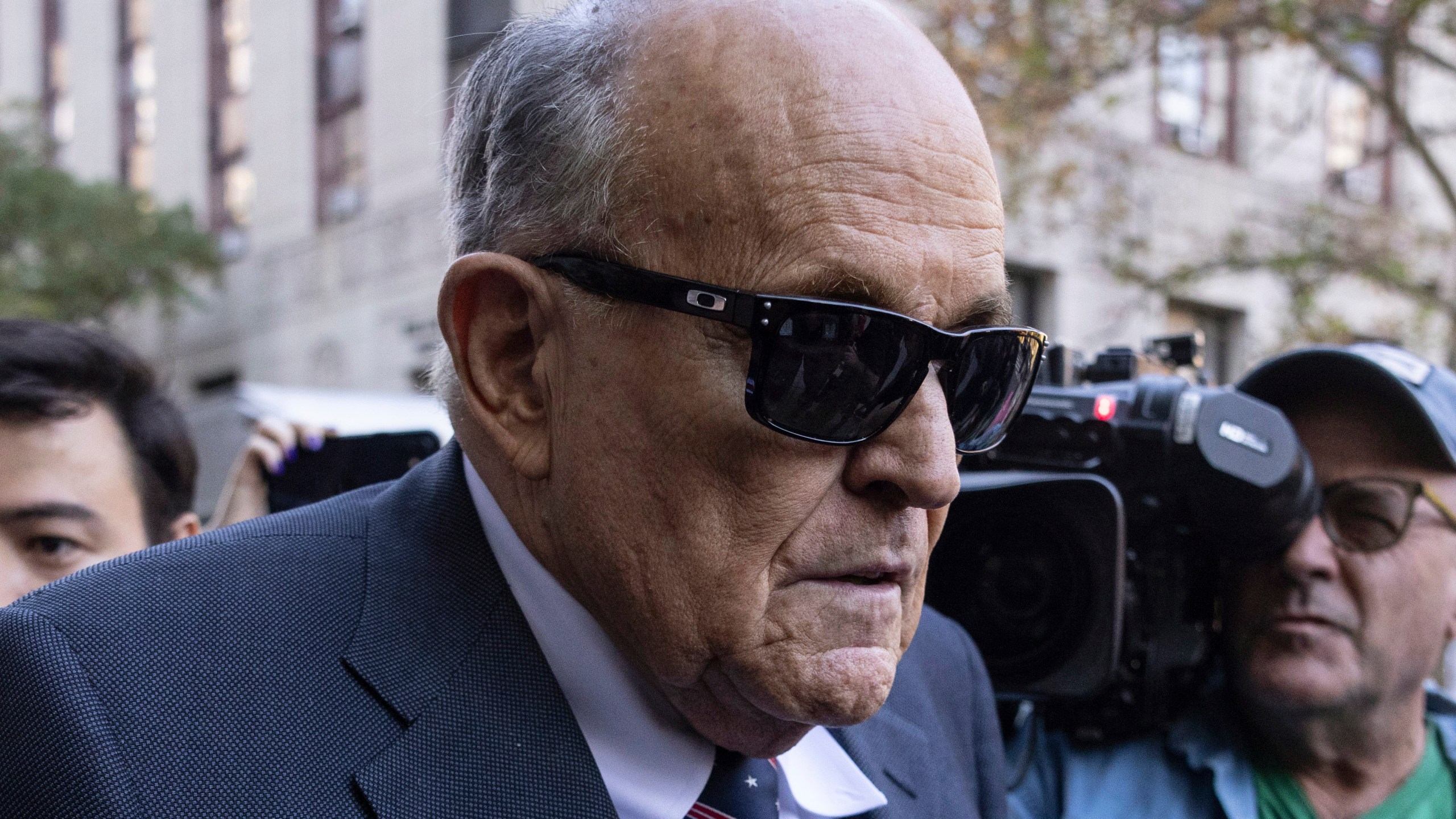 Former New York City Mayor Rudy Giuliani arrives at the court to explain to a federal judge why he hasn't surrendered his valuables as part of a $148 million defamation judgment, in New York, Thursday, Nov. 7, 2024. (AP Photo/Yuki Iwamura)