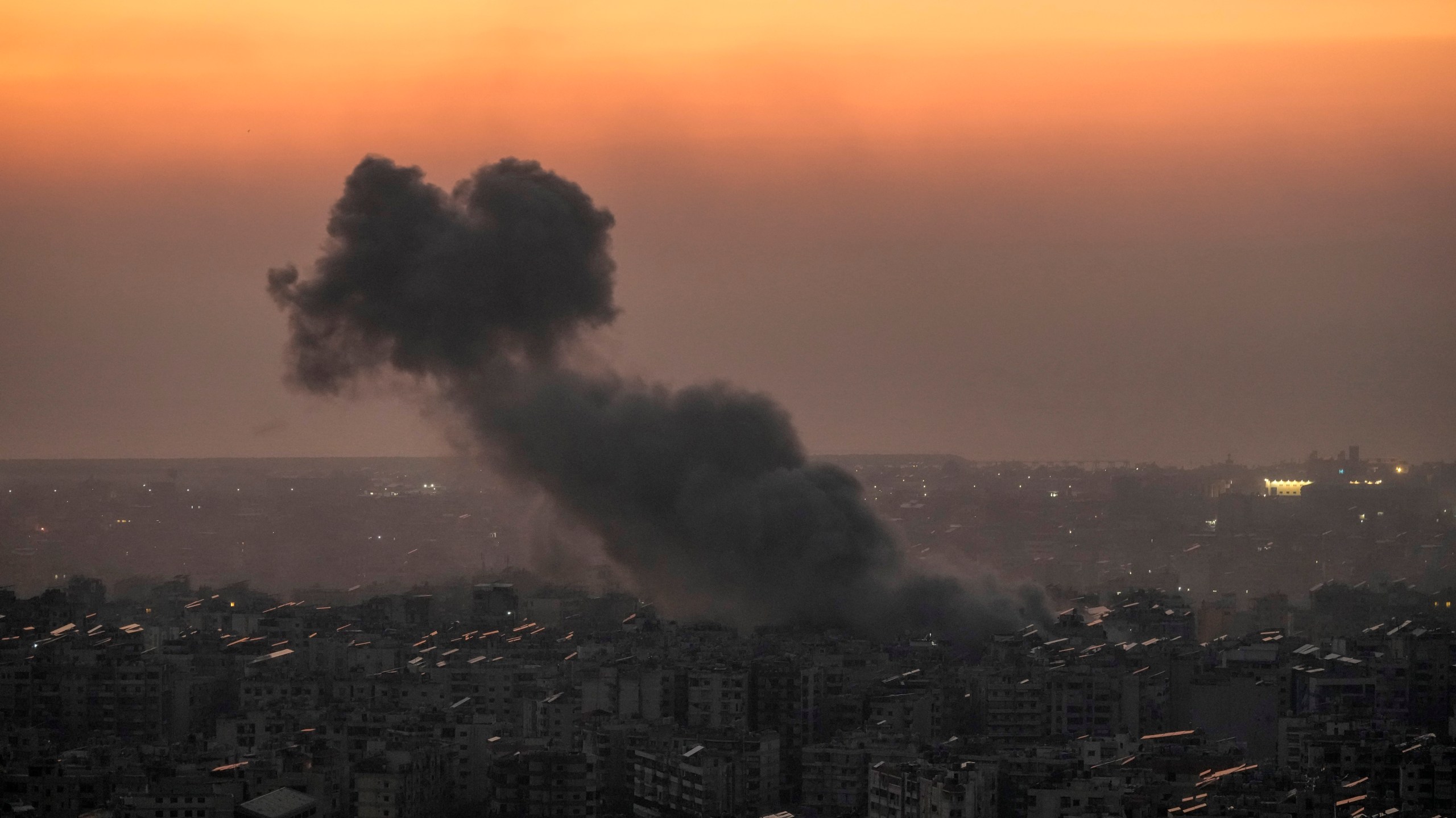 Smoke rises from an Israeli airstrike on Dahiyeh, in the southern suburb of Beirut, Lebanon, Wednesday, Nov. 6, 2024. (AP Photo/Bilal Hussein)