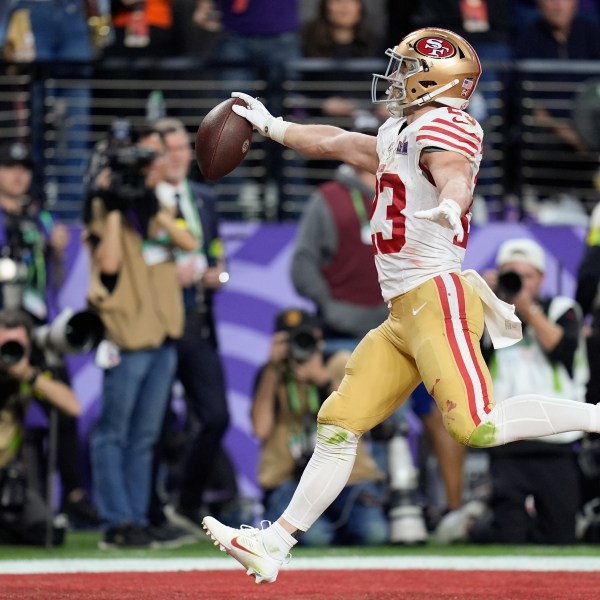 FILE - San Francisco 49ers running back Christian McCaffrey (23) scores a touchdown against the Kansas City Chiefs during the first half of the NFL Super Bowl 58 football game Sunday, Feb. 11, 2024, in Las Vegas. (AP Photo/Eric Gay, File)