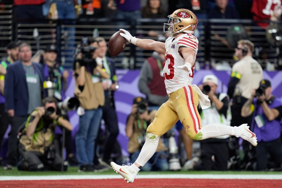 FILE - San Francisco 49ers running back Christian McCaffrey (23) scores a touchdown against the Kansas City Chiefs during the first half of the NFL Super Bowl 58 football game Sunday, Feb. 11, 2024, in Las Vegas. (AP Photo/Eric Gay, File)