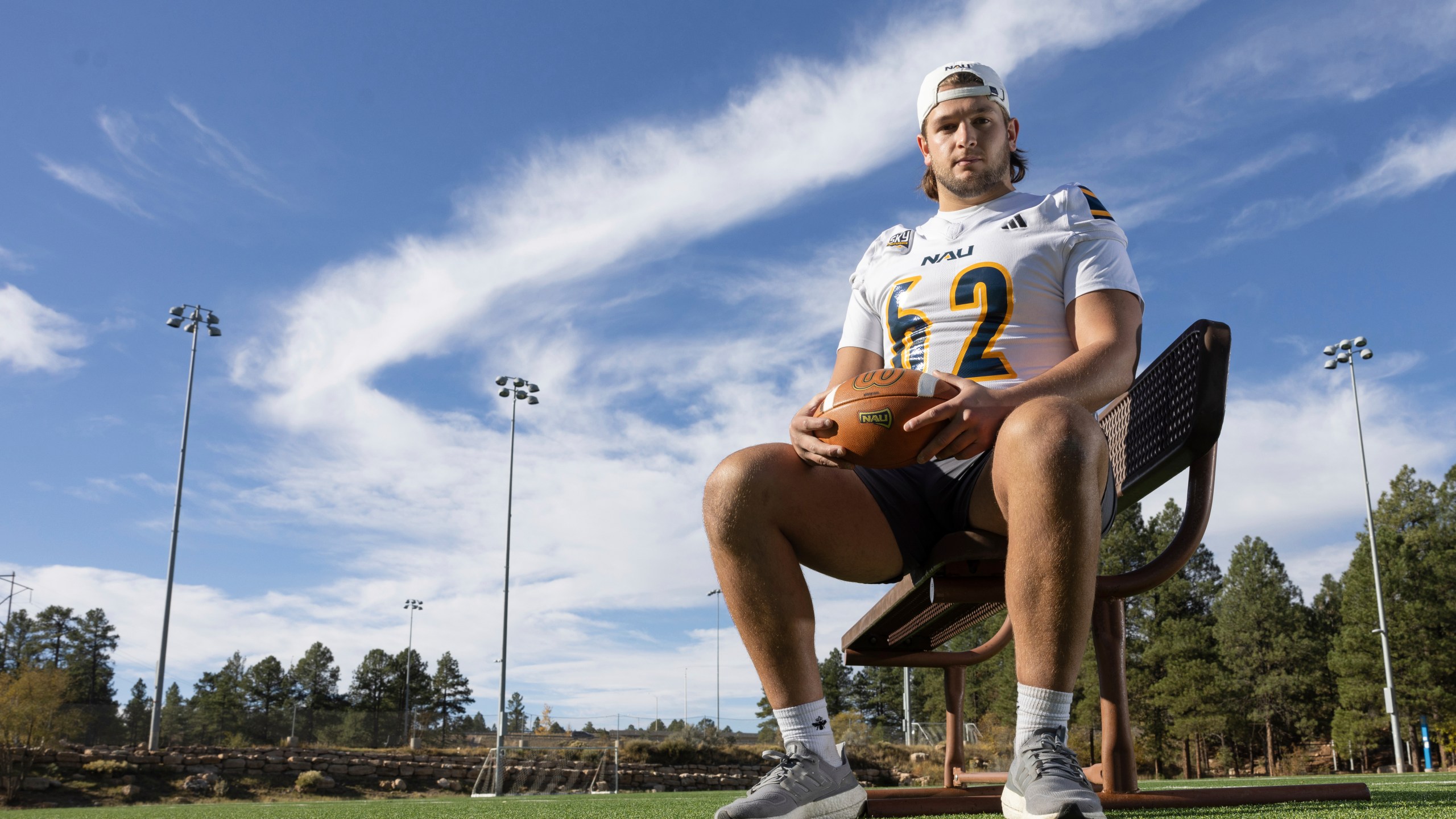 Northern Arizona University's Jonny Bottorff took advantage of new NIL money making opportunities and rebooted his college football career. Bottorff poses for a photo on the campus on NAU on Monday, Oct. 28, 2024, in Flagstaff, Ariz. (AP Photo/Josh Biggs)