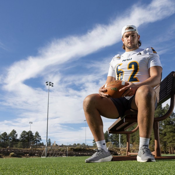 Northern Arizona University's Jonny Bottorff took advantage of new NIL money making opportunities and rebooted his college football career. Bottorff poses for a photo on the campus on NAU on Monday, Oct. 28, 2024, in Flagstaff, Ariz. (AP Photo/Josh Biggs)