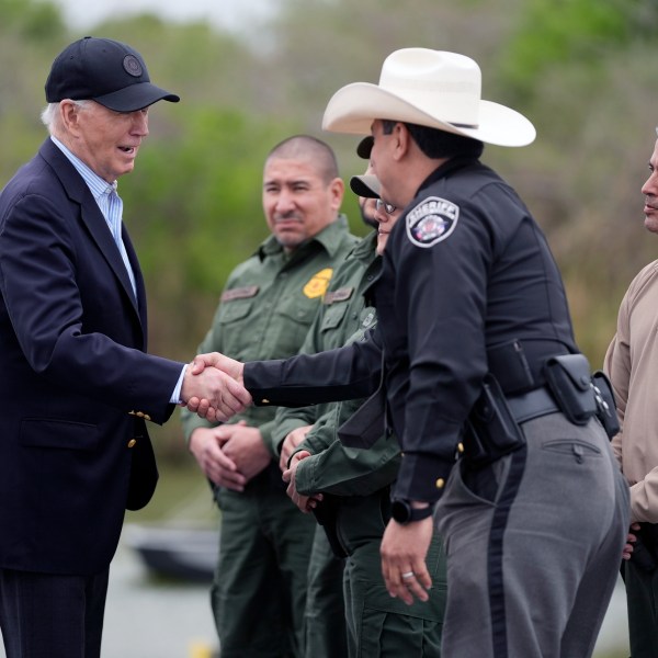 FILE - President Joe Biden talks with the U.S. Border Patrol and local officials, as he looks over the southern border, Feb. 29, 2024, in Brownsville, Texas, along the Rio Grande. (AP Photo/Evan Vucci, File)