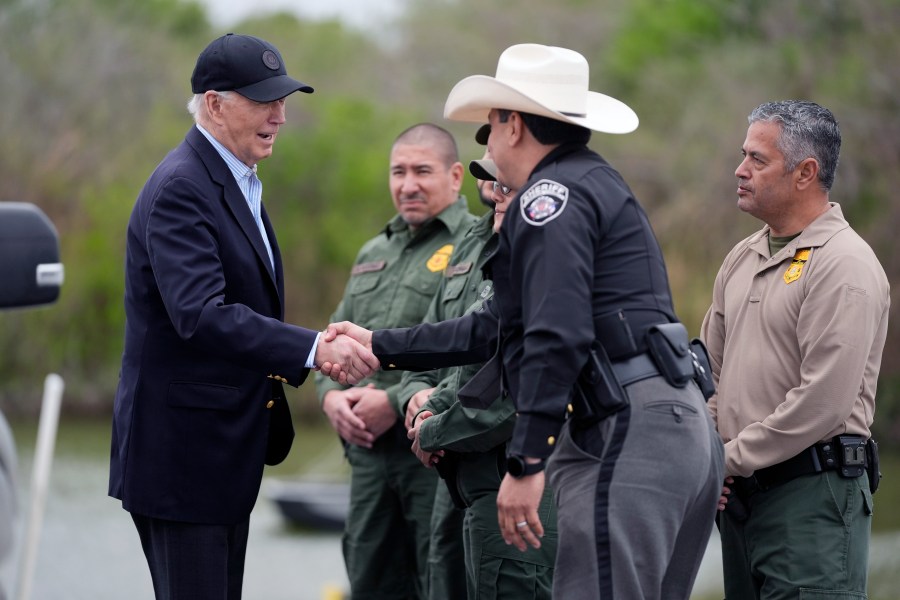 FILE - President Joe Biden talks with the U.S. Border Patrol and local officials, as he looks over the southern border, Feb. 29, 2024, in Brownsville, Texas, along the Rio Grande. (AP Photo/Evan Vucci, File)