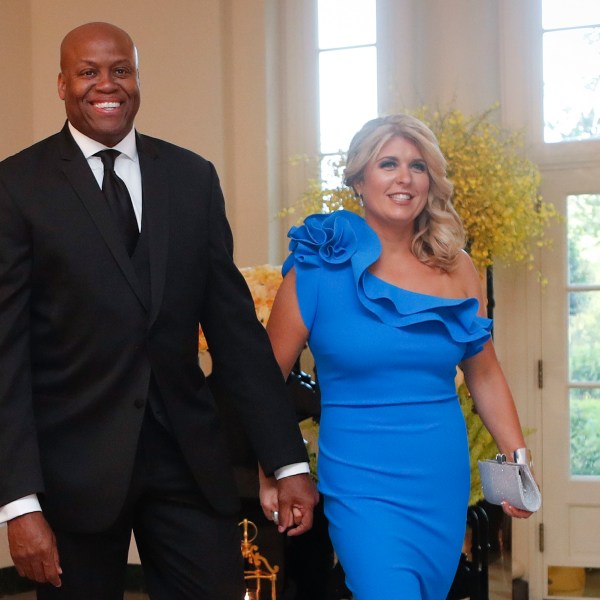 FILE - Craig Robinson, brother of former first lady Michelle Obama, and his wife, Kelly Robinson, arrive for a State Dinner for Singapore's Prime Minister Lee Hsien Loong, Aug. 2, 2016, at the White House in Washington. (AP Photo/Pablo Martinez Monsivais, File)