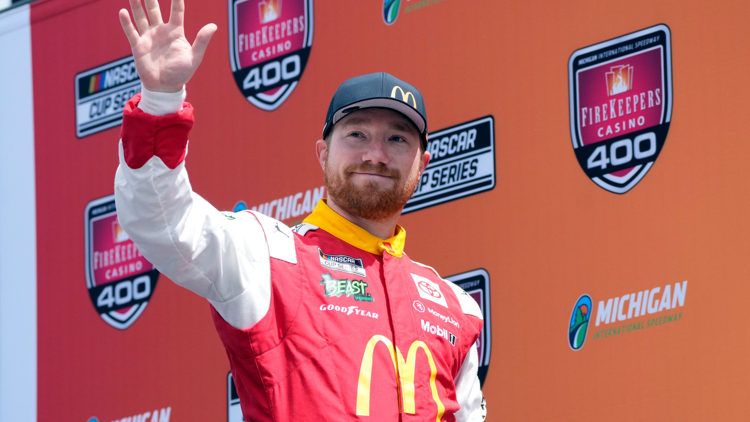 FILE - Tyler Reddick is introduced before a NASCAR Cup Series auto race at Michigan International Speedway, Aug. 18, 2024, in Brooklyn, Mich. (AP Photo/Carlos Osorio, File)