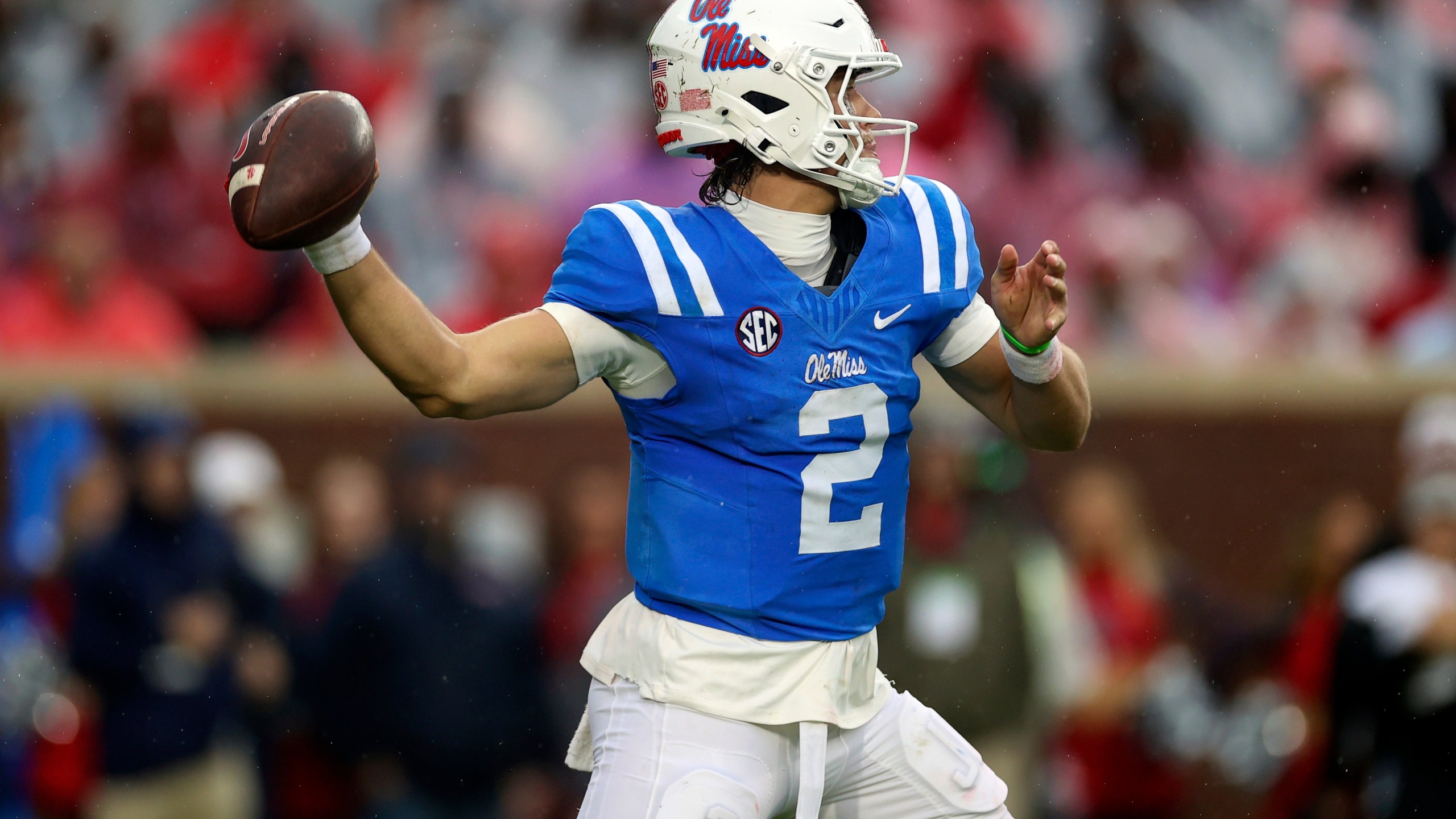 Mississippi quarterback Jaxson Dart (2) throws a pass during the first half of an NCAA college football game against Georgia, Saturday, Nov. 9, 2024, in Oxford, Miss. (AP Photo/Randy J. Williams)