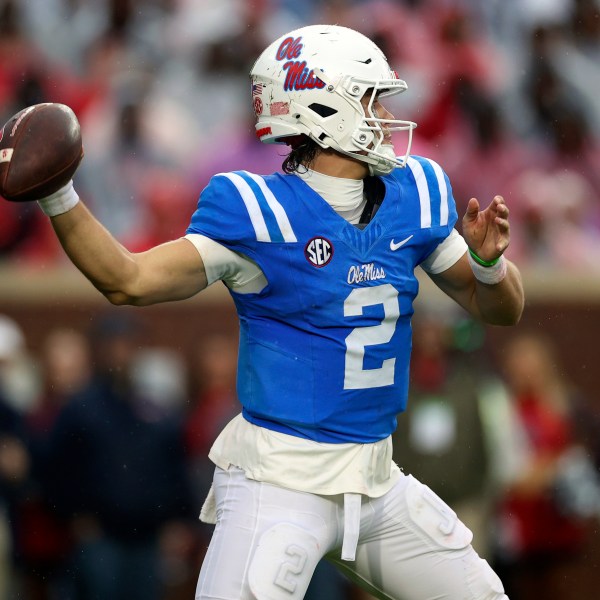 Mississippi quarterback Jaxson Dart (2) throws a pass during the first half of an NCAA college football game against Georgia, Saturday, Nov. 9, 2024, in Oxford, Miss. (AP Photo/Randy J. Williams)