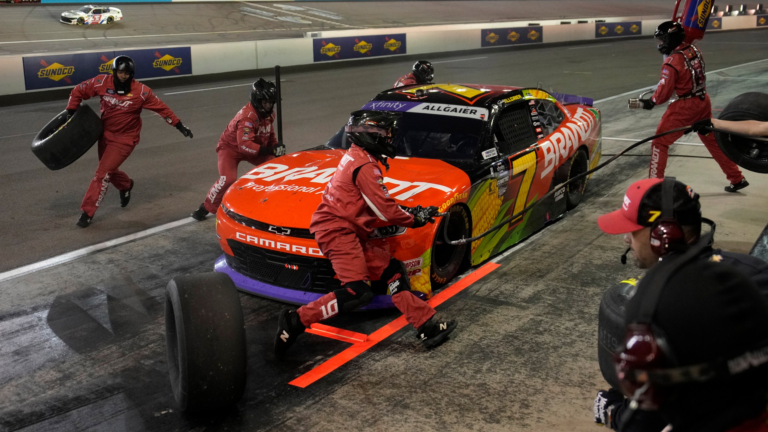 Justin Allgaier makes a pit stop during a NASCAR Xfinity Series auto race, Saturday, Nov. 9, 2024, in Avondale, Ariz. (AP Photo/John Locher)