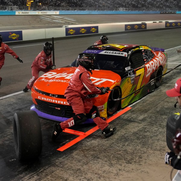 Justin Allgaier makes a pit stop during a NASCAR Xfinity Series auto race, Saturday, Nov. 9, 2024, in Avondale, Ariz. (AP Photo/John Locher)