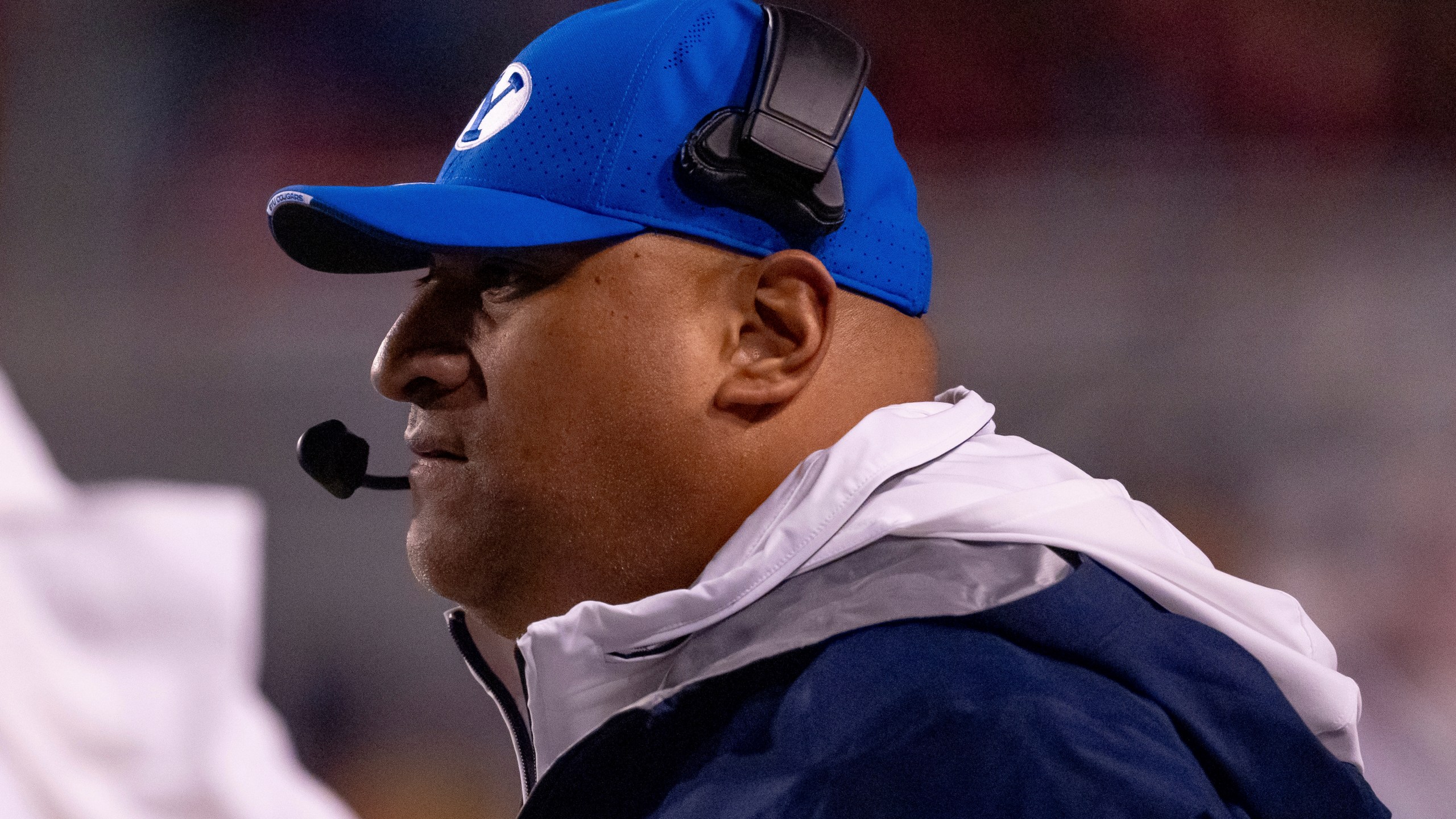 BYU head coach Kalani Sitake watches from the sideline in the first half of an NCAA college football game against Utah, Saturday, Nov. 9, 2024, in Salt Lake City. (AP Photo/Spenser Heaps)