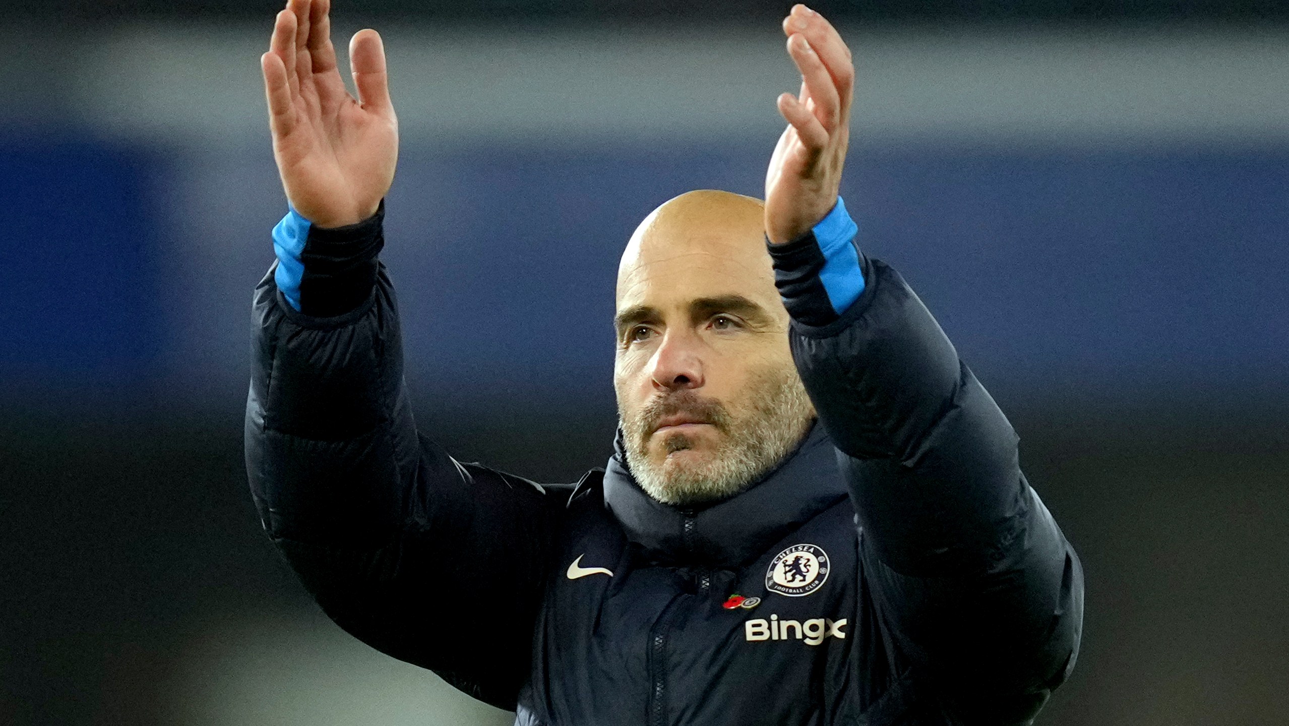 Chelsea's head coach Enzo Maresca applauds at the end of the English Premier League soccer match between Chelsea and Arsenal at Stamford Bridge stadium in London, Sunday, Nov. 10, 2021. (AP Photo/Kirsty Wigglesworth)