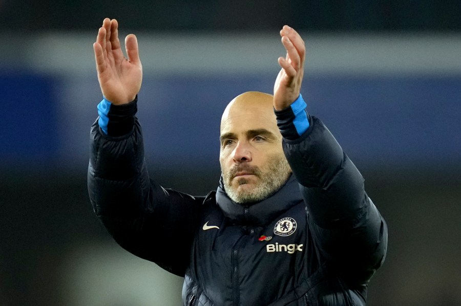 Chelsea's head coach Enzo Maresca applauds at the end of the English Premier League soccer match between Chelsea and Arsenal at Stamford Bridge stadium in London, Sunday, Nov. 10, 2021. (AP Photo/Kirsty Wigglesworth)