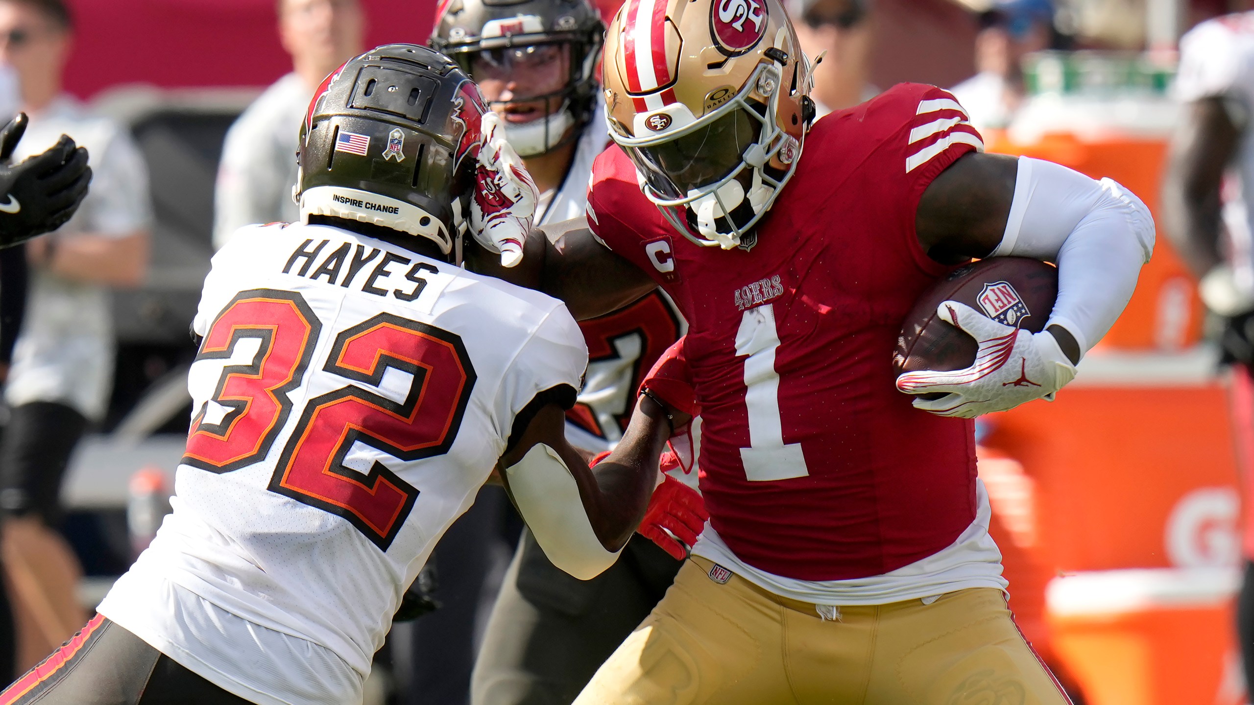 San Francisco 49ers wide receiver Deebo Samuel Sr. (1) runs against Tampa Bay Buccaneers safety Josh Hayes (32) during the second half of an NFL football game in Tampa, Fla., Sunday, Nov. 10, 2024. (AP Photo/Chris O'Meara)