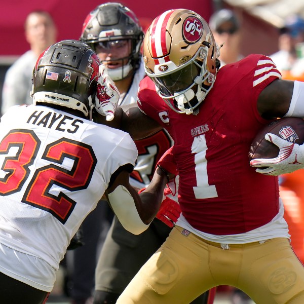 San Francisco 49ers wide receiver Deebo Samuel Sr. (1) runs against Tampa Bay Buccaneers safety Josh Hayes (32) during the second half of an NFL football game in Tampa, Fla., Sunday, Nov. 10, 2024. (AP Photo/Chris O'Meara)