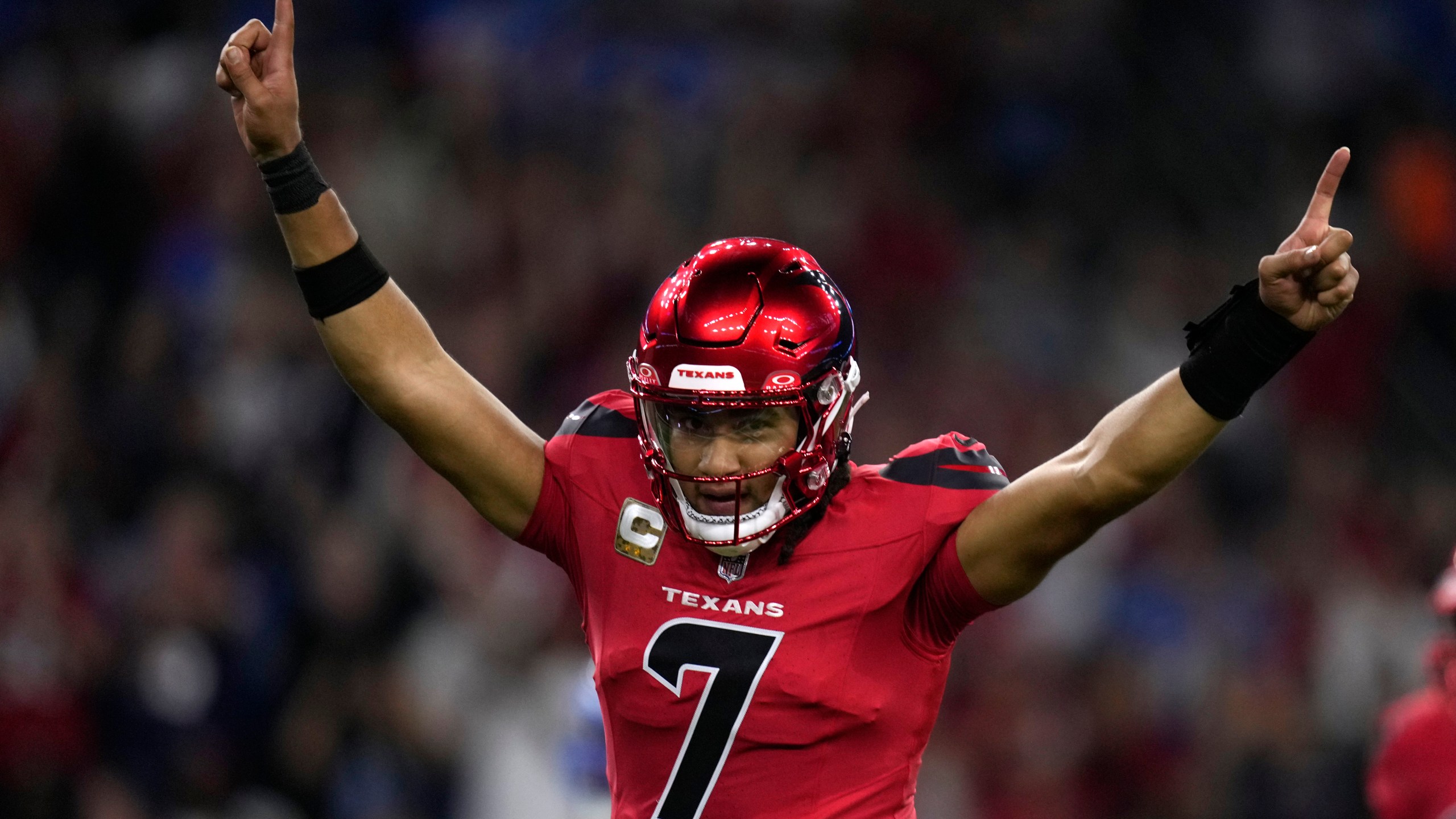 Houston Texans quarterback C.J. Stroud celebrates after throwing a touchdown pass during the first half of an NFL football game against the Detroit Lions, Sunday, Nov. 10, 2024, in Houston. (AP Photo/Eric Christian Smith)