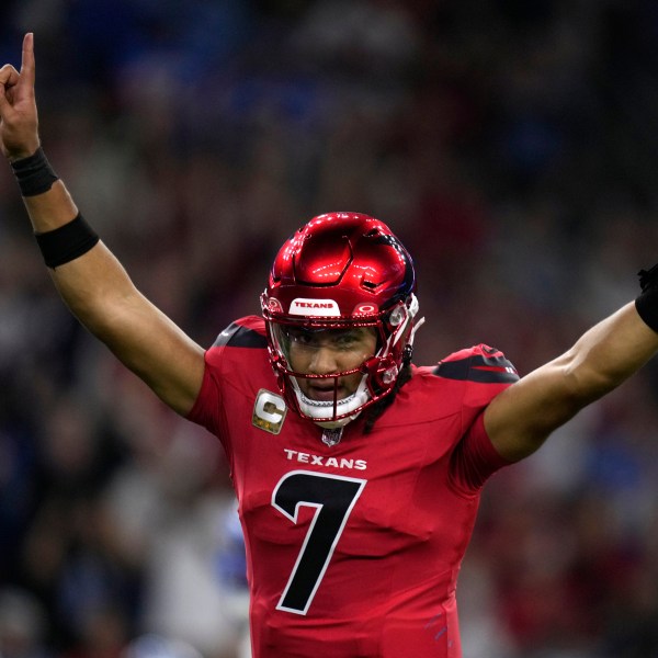 Houston Texans quarterback C.J. Stroud celebrates after throwing a touchdown pass during the first half of an NFL football game against the Detroit Lions, Sunday, Nov. 10, 2024, in Houston. (AP Photo/Eric Christian Smith)