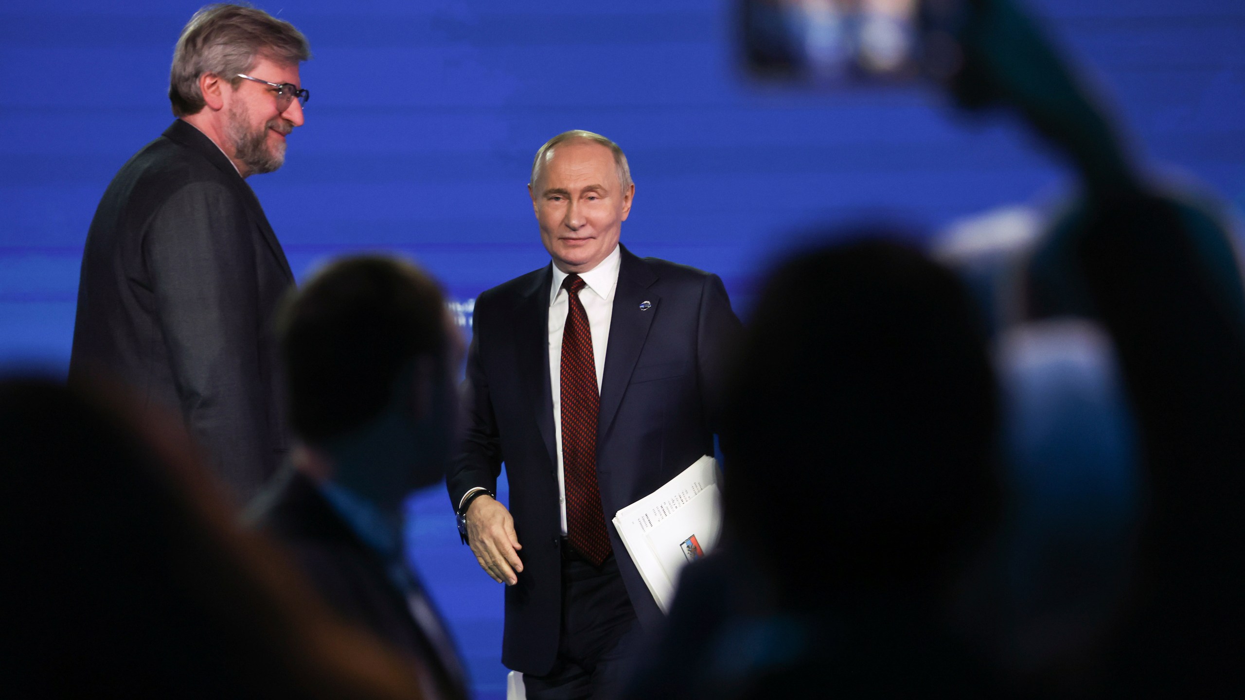 Russian President Vladimir Putin, center, leaves a meeting with foreign policy experts at the Valdai Discussion Club in the Black Sea resort of Sochi, Russia, early Friday, Nov. 8, 2024. (Maxim Shipenkov/Pool Photo via AP)