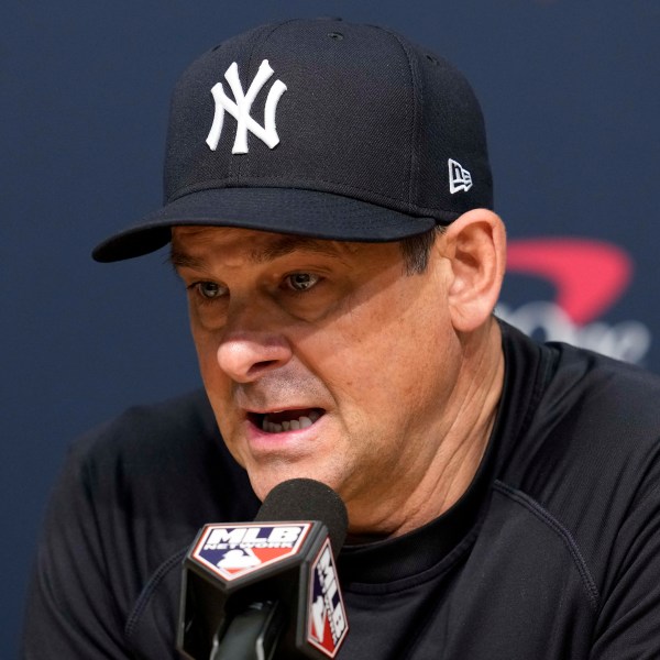 New York Yankees manager Aaron Boone speaks during a news conference before Game 1 of the baseball World Series against the Los Angeles Dodgers, Friday, Oct. 25, 2024, in Los Angeles. (AP Photo/Godofredo A. Vásquez)