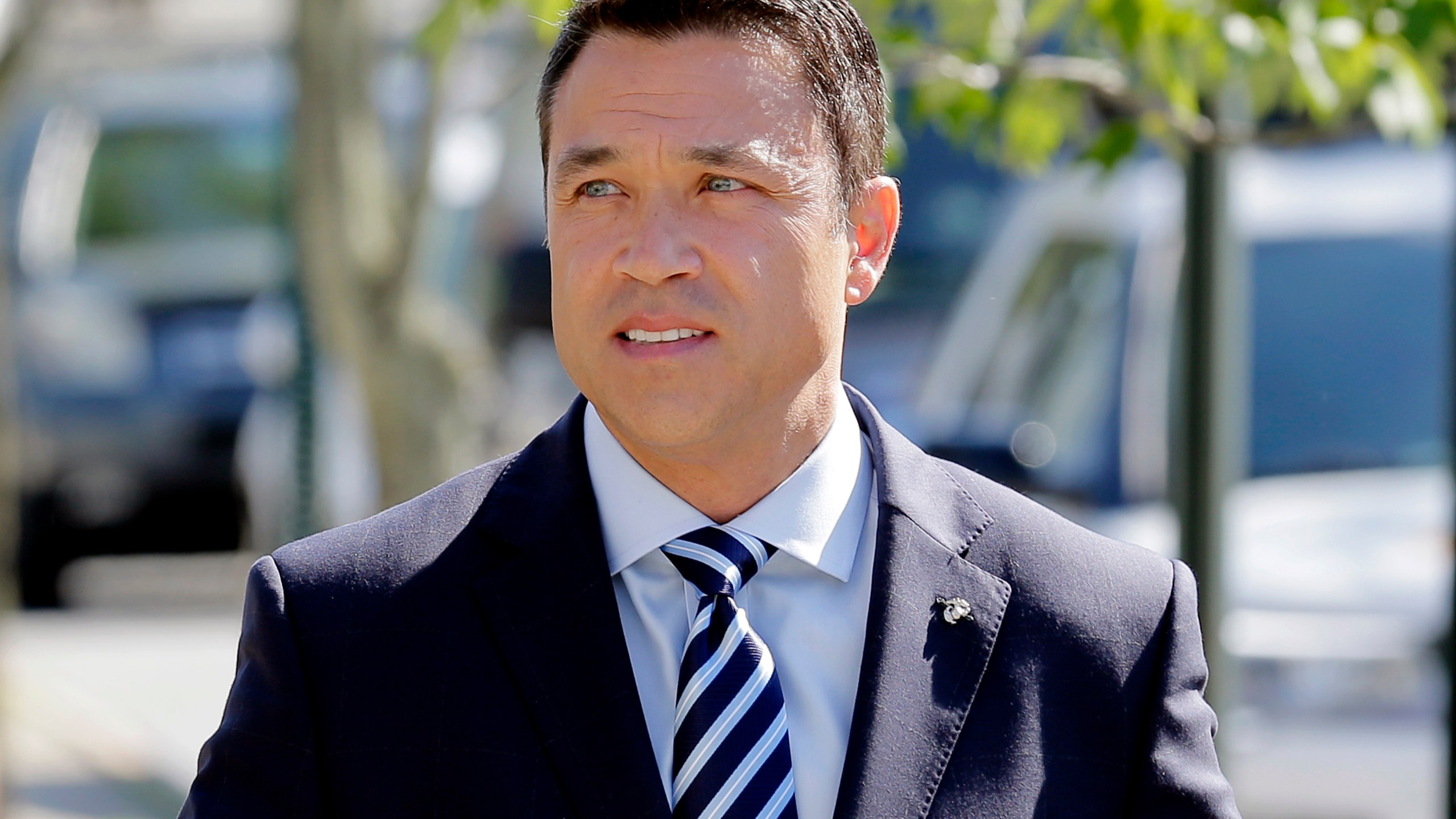 FILE — Former U.S. Rep. Michael Grimm arrives to his polling site in the Staten Island borough of New York, June 26, 2018. (AP Photo/Seth Wenig, File)