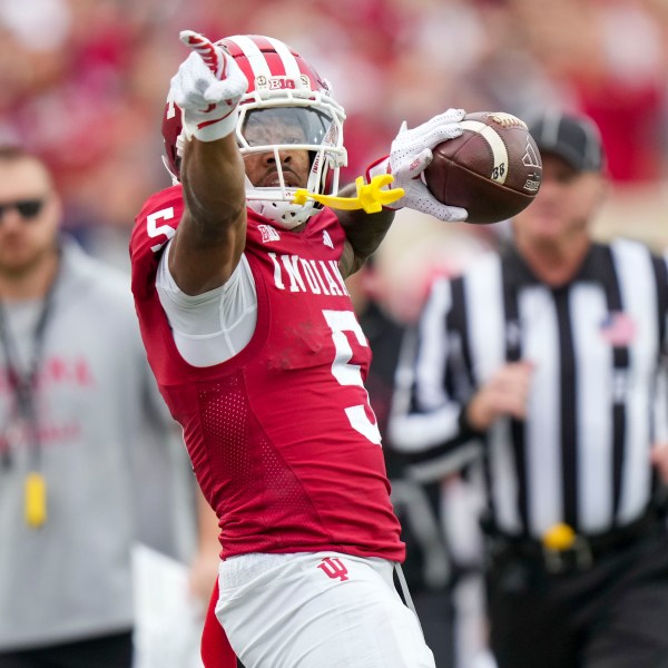 Indiana wide receiver Ke'Shawn Williams (5) reacts after completing a catch against Michigan during the first half of an NCAA college football game in Bloomington, Ind., Saturday, Nov. 9, 2024. (AP Photo/AJ Mast)