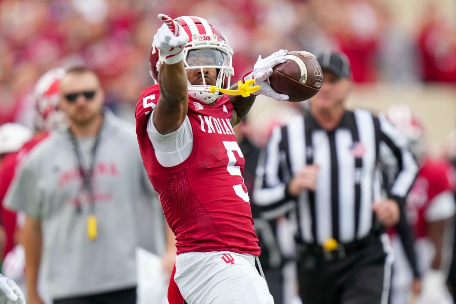 Indiana wide receiver Ke'Shawn Williams (5) reacts after completing a catch against Michigan during the first half of an NCAA college football game in Bloomington, Ind., Saturday, Nov. 9, 2024. (AP Photo/AJ Mast)