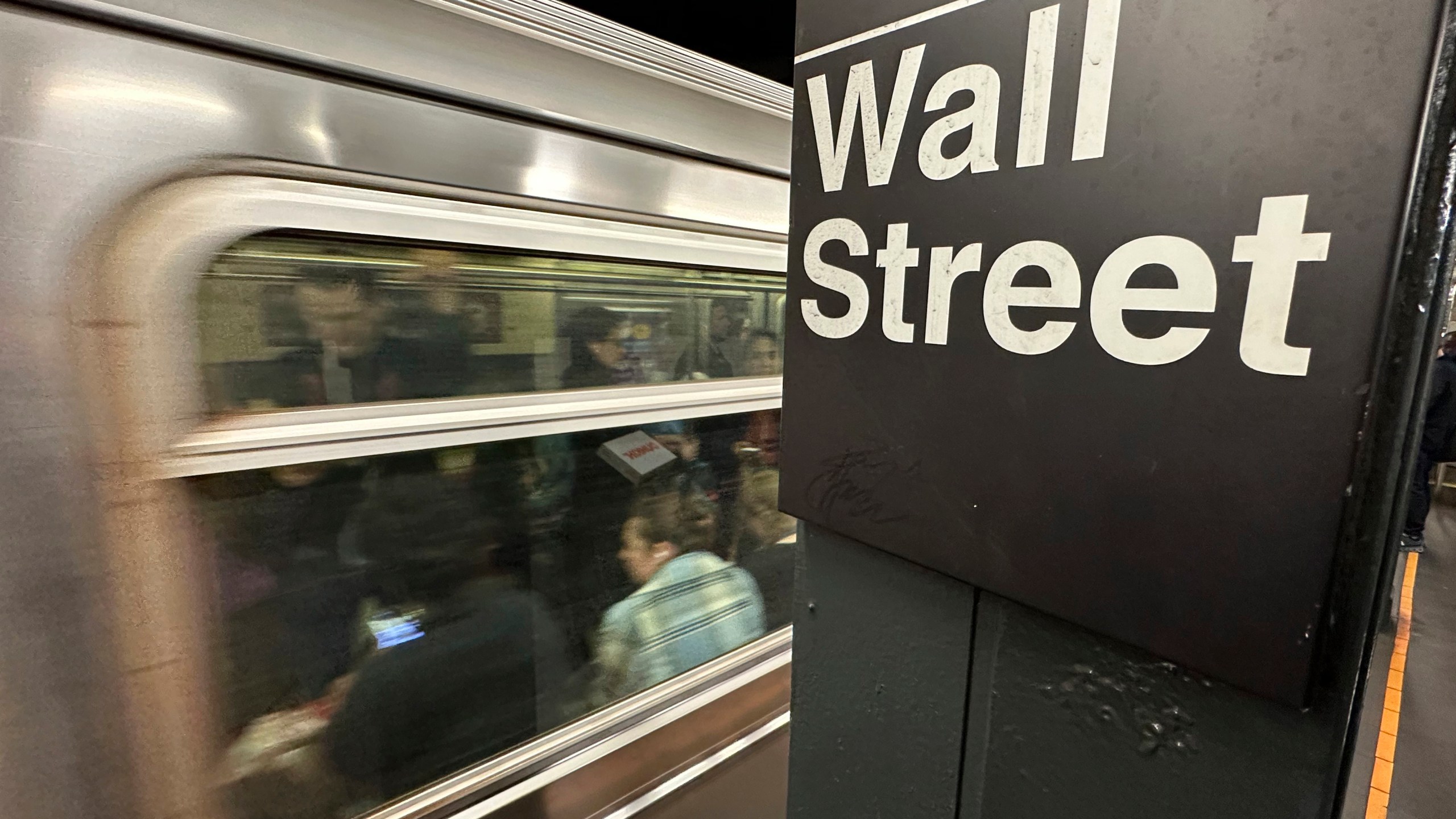 FILE - A train arrives at a Wall Street subway station in New York's Financial District on Nov. 5, 2024. (AP Photo/Peter Morgan, File)