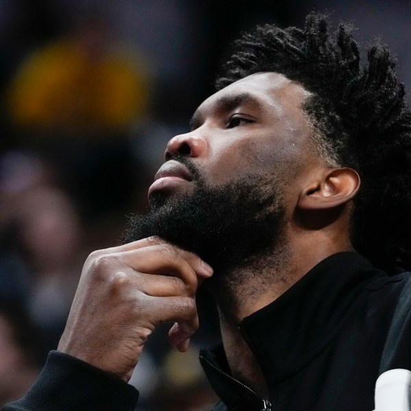 Philadelphia 76ers' Joel Embiid watches from the bench during the second half of an NBA basketball game against the Indiana Pacers, Sunday, Oct. 27, 2024, in Indianapolis. (AP Photo/Darron Cummings)