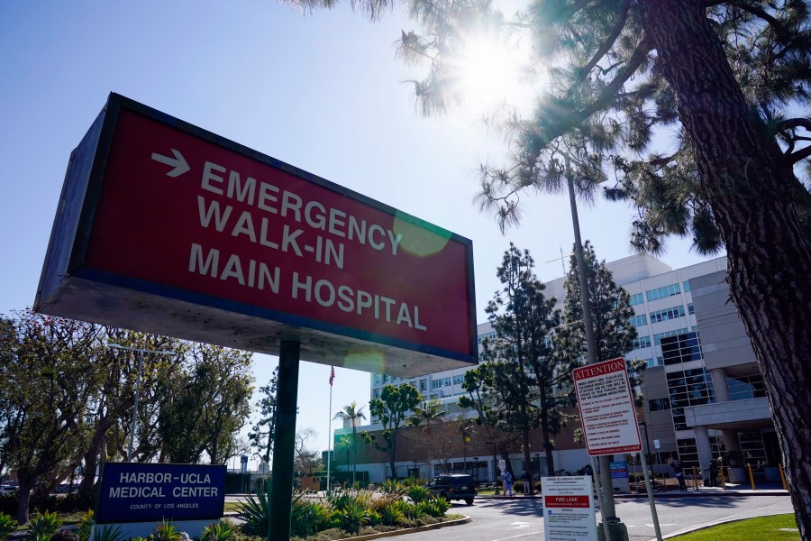 FILE - An emergency room sign is displayed outside Harbor-UCLA Medical Center, Feb. 24, 2021, in Torrance, Calif. (AP Photo/Ashley Landis, File)