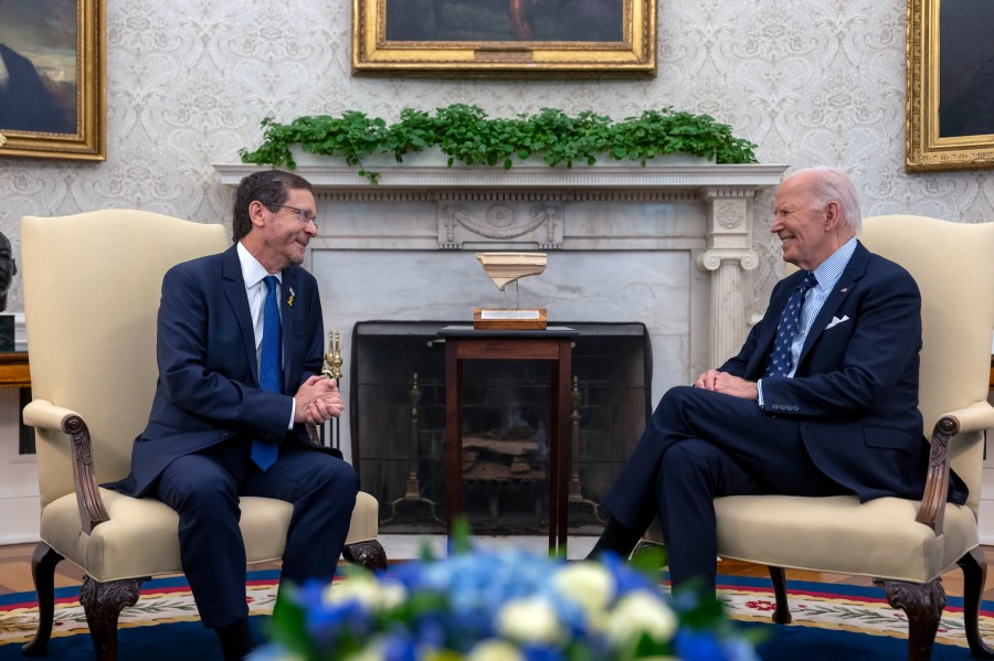 President Joe Biden meets with Israel's President Isaac Herzog, left, in the Oval Office of the White House in Washington, Tuesday, Nov. 12, 2024. (AP Photo/Ben Curtis)