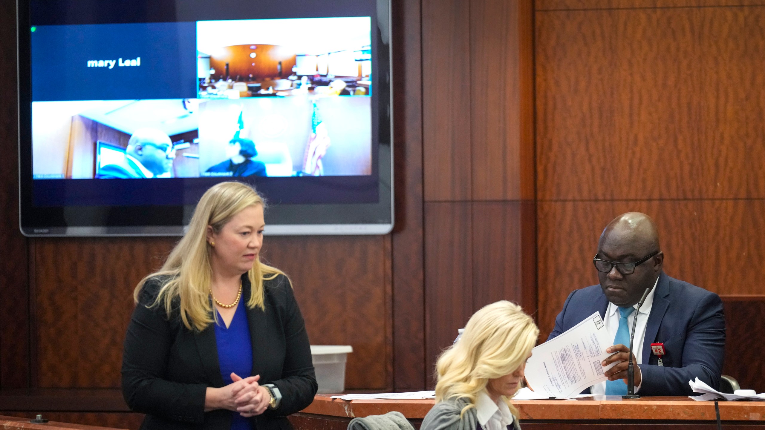 Prosecutor Celeste Byron, left, questions Dr. Kwabena Sarpong, of Texas Children's Hospital, during the punishment phase in Gloria Williams' trial, Tuesday, Nov. 12, 2024, at the Harris County Criminal Justice Center in Houston. (Brett Coomer/Houston Chronicle via AP)