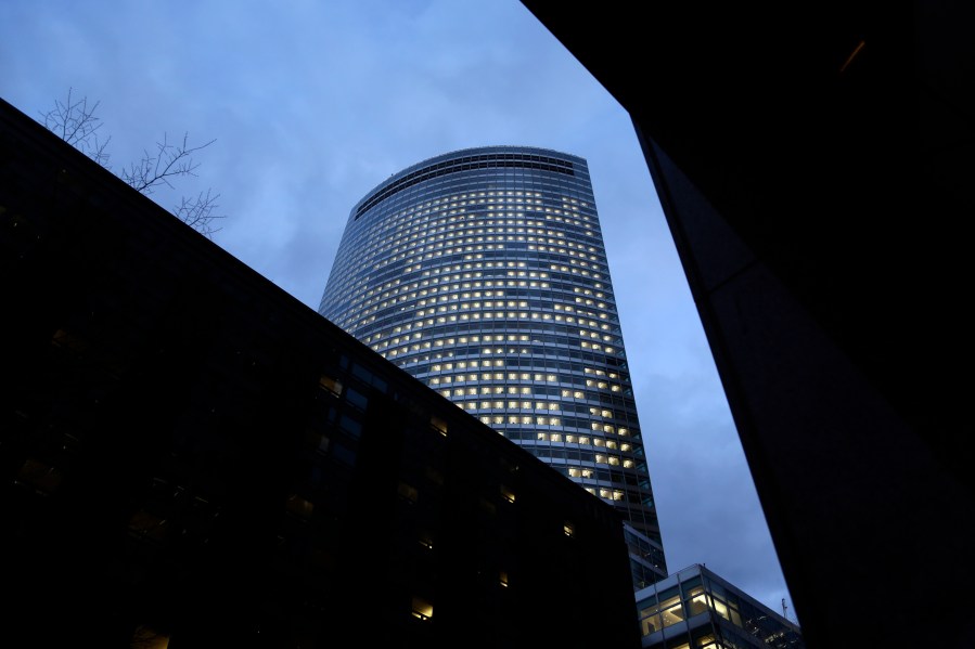 FILE - Lights are on at the world headquarters of Goldman Sachs in New York on Jan. 24, 2023. (AP Photo/Peter Morgan, File)