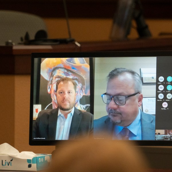 FILE - Arizona Rep. Jake Hoffman, R-Queen Creek, left, and his attorney Timothy La Sota appear virtually for Hoffman's arraignment in Maricopa County Superior Court in Phoenix, June 6, 2024. (Mark Henle/The Arizona Republic via AP, Pool, File)