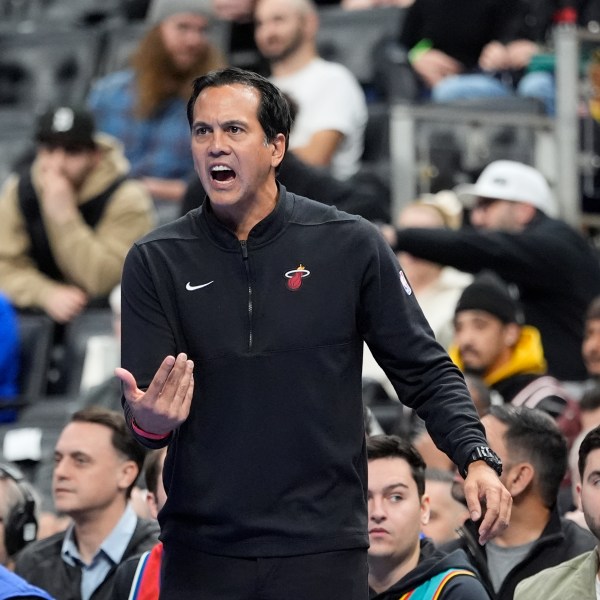 Miami Heat head coach Erik Spoelstra yells during the first half of an Emirates NBA Cup basketball game against the Detroit Pistons, Tuesday, Nov. 12, 2024, in Detroit. (AP Photo/Carlos Osorio)