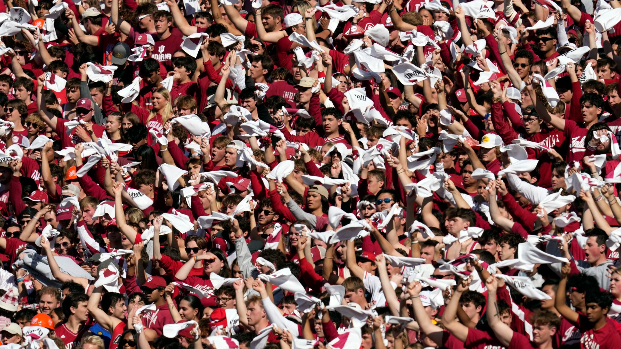 Indiana students cheer during the first half of an NCAA college football game between Indiana and Washington, Saturday, Oct. 26, 2024, in Bloomington, Ind. (AP Photo/Darron Cummings)