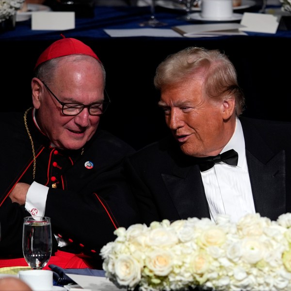 Republican presidential nominee former President Donald Trump talks with Cardinal Timothy Dolan at the 79th annual Alfred E. Smith Memorial Foundation Dinner, Thursday, Oct. 17, 2024, in New York. (AP Photo/Julia Demaree Nikhinson)