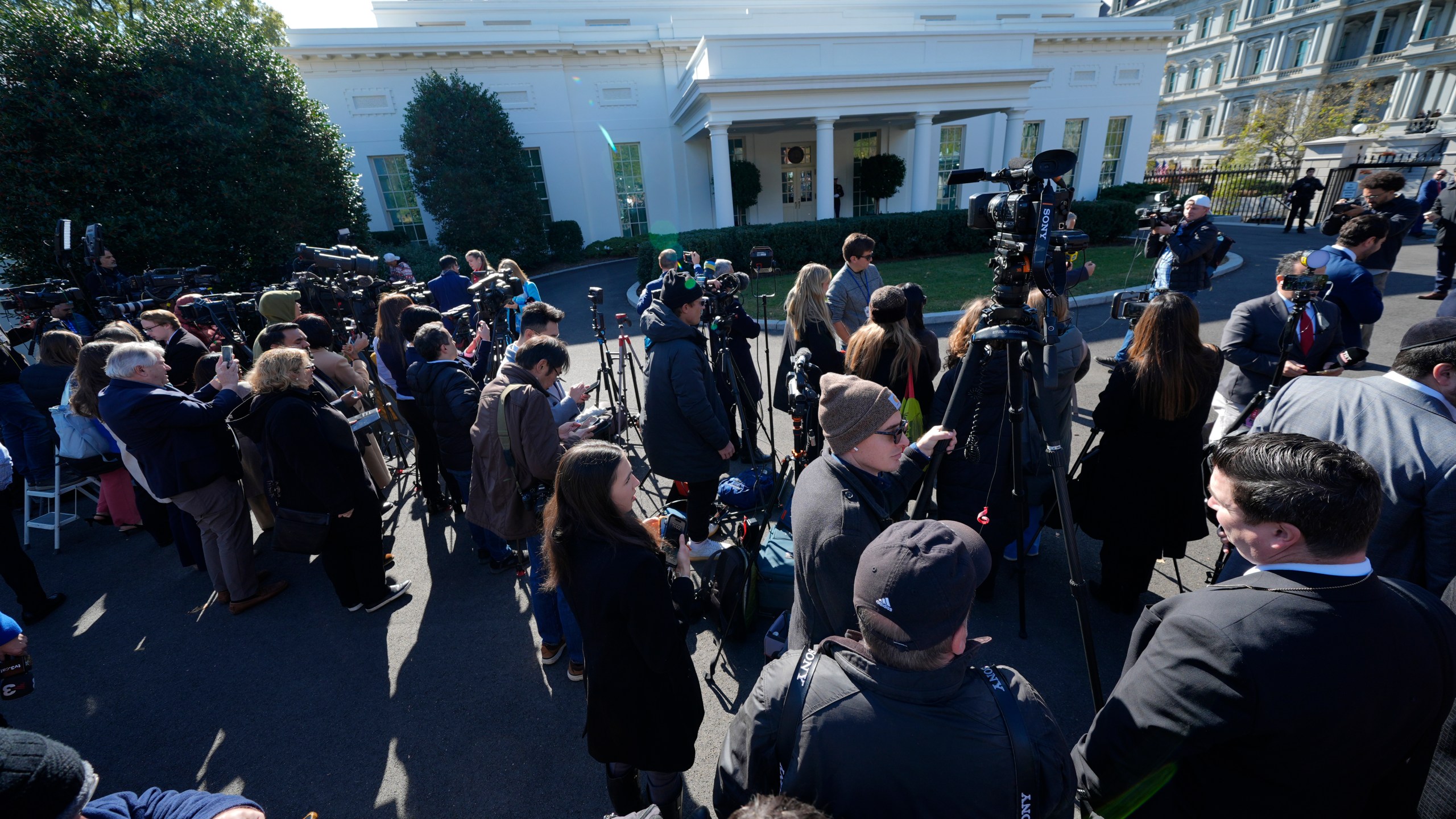 Members of the press gather outside the West Wing of the White House in Washington, Wednesday, Nov. 13, 2024, before President Joe Biden meets with President-elect Donald Trump in the Oval Office. (AP Photo/Susan Walsh)