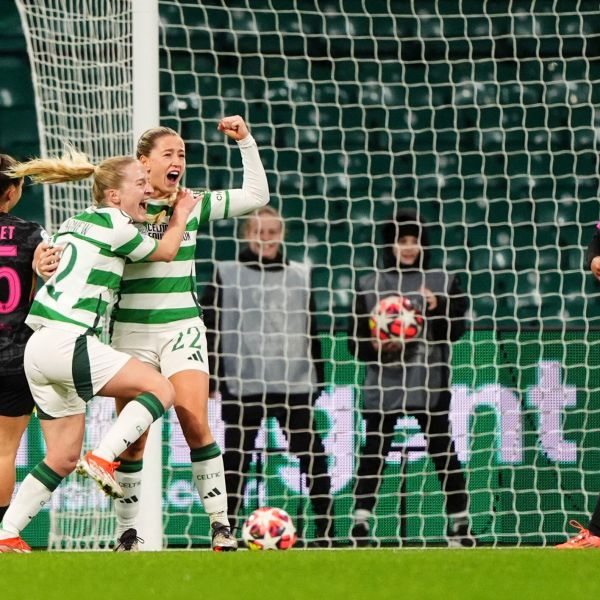 Celtic's Murphy Agnew, center, celebrates scoring her side's first goal of the game, during the Women's Champions League, group B soccer match between Celtic Women and Chelsea Women, at Celtic Park, Glasgow, Scotland, Wednesday Nov. 13, 2024. (Andrew Milligan/PA via AP)