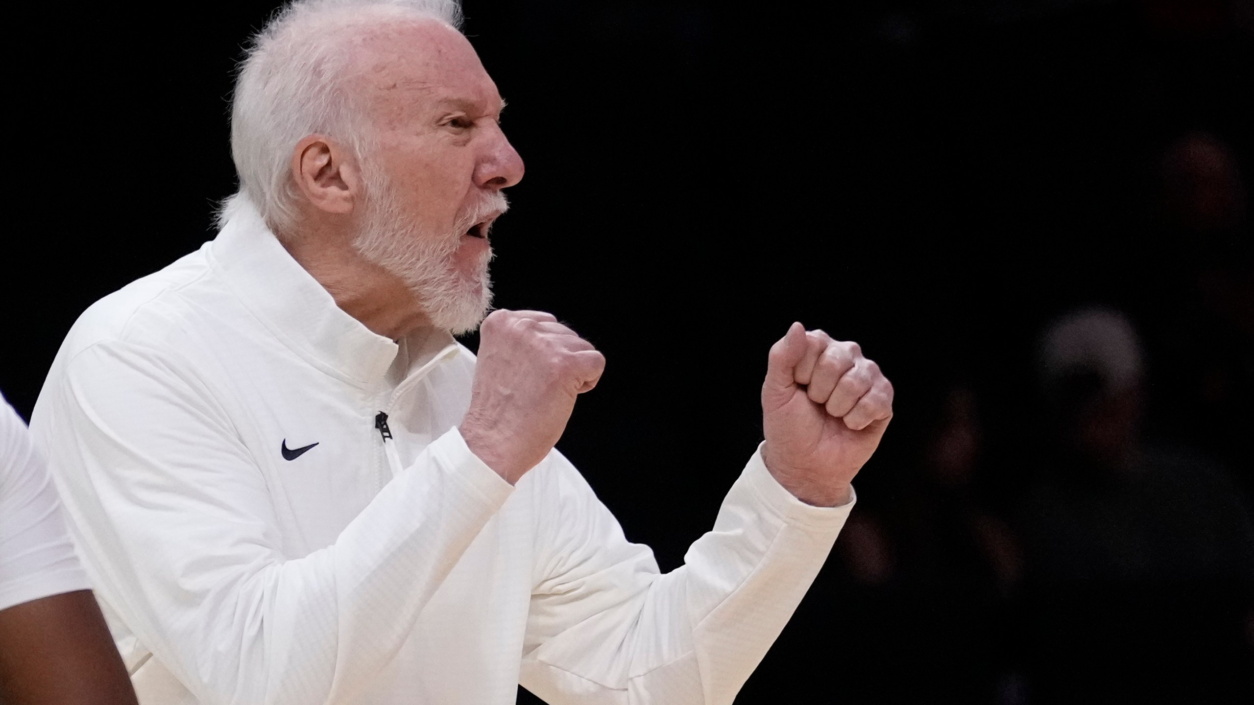 San Antonio Spurs head coach Gregg Popovich calls out to players during the first half of an NBA preseason basketball game against the Miami Heat, Tuesday, Oct. 15, 2024, in Miami. (AP Photo/Wilfredo Lee)